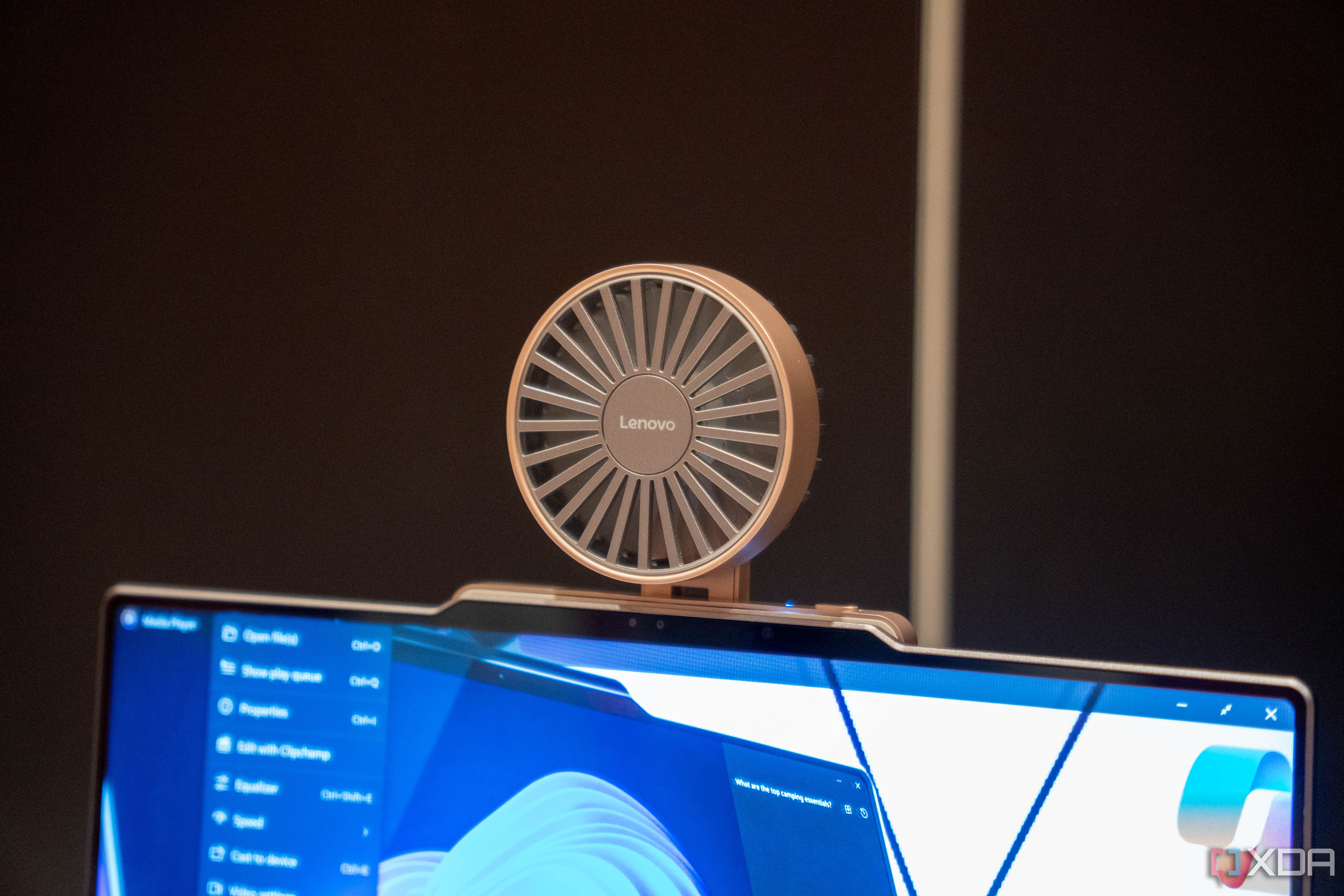 A Lenovo ThinkBook 13x Gen 4 with a concept Magic Bay accessory with a fan
