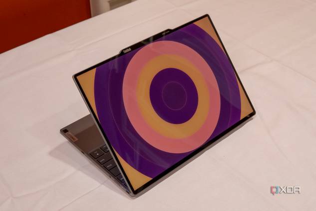 Angled view of the Lenovo ThinkBook 13x Gen 4 SPE showing a circular patter in orange and purple on the lid