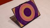 Angled view of the Lenovo ThinkBook 13x Gen 4 SPE showing a circular patter in orange and purple on the lid