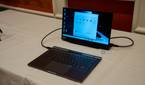 A Lenovo ThinkBook Plus Gen 5 Hybrid Station connected to an external display