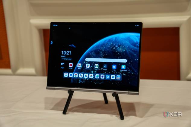 A Lenovo ThinkBook Plus Gen 5 Hybrid Tab on a stand showing the Android home screen