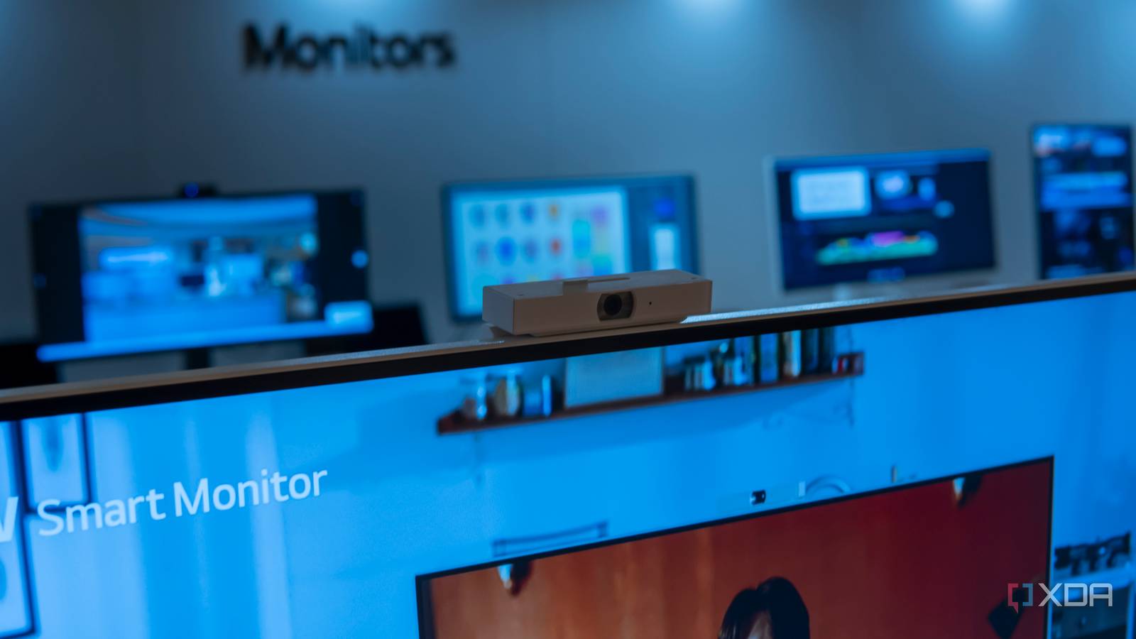 LG Monitor-23 webcam with monitors displayed in background