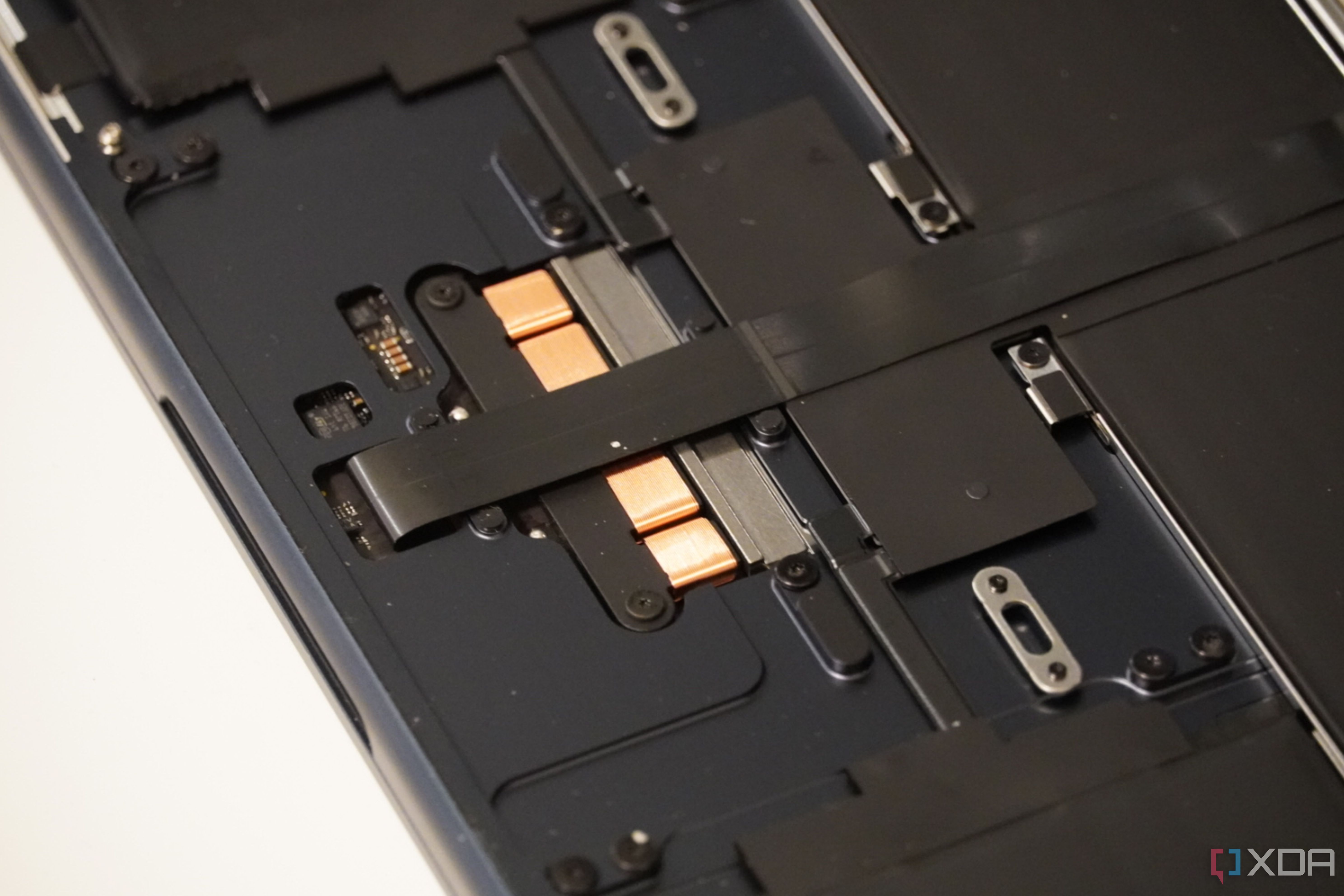 A close up of a MacBook with the cover remove.