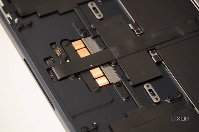 A close up of a MacBook with the cover remove.