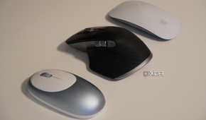Comparing three mice on a desk.