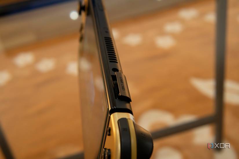 Close-up of the game card slot on the Nintendo Switch OLED model
