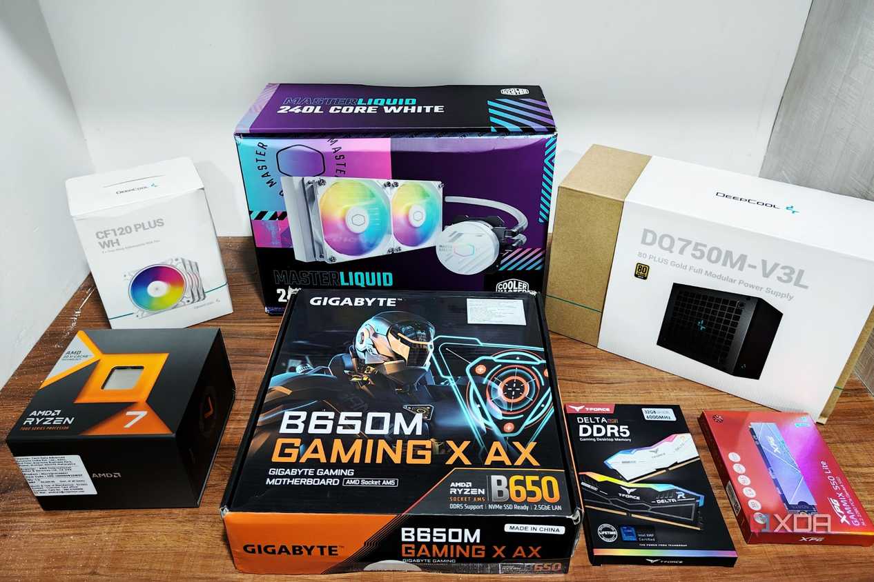 An image showing a bunch of PC components kept on a table in their retail boxes.