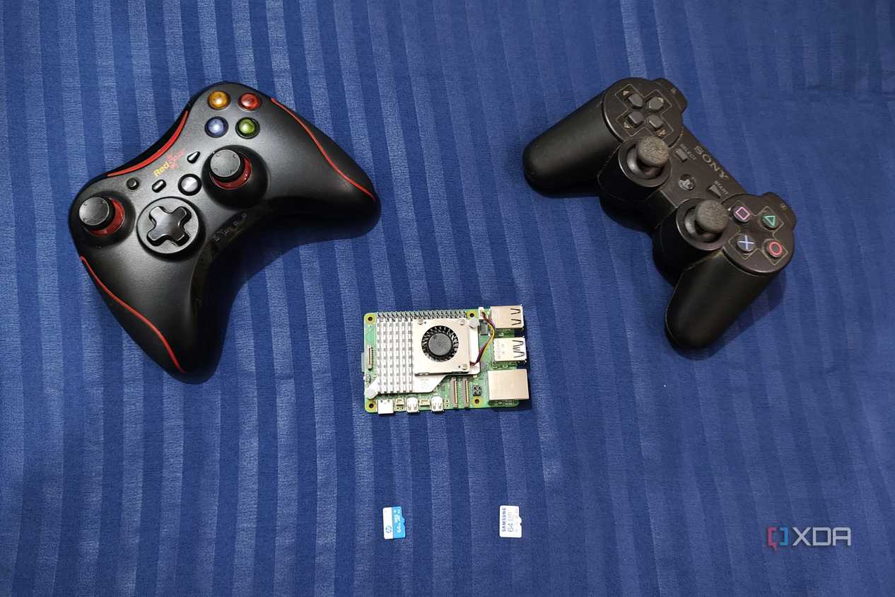 An image of the Raspberry Pi 5 with two controllers and two microSD cards nearby