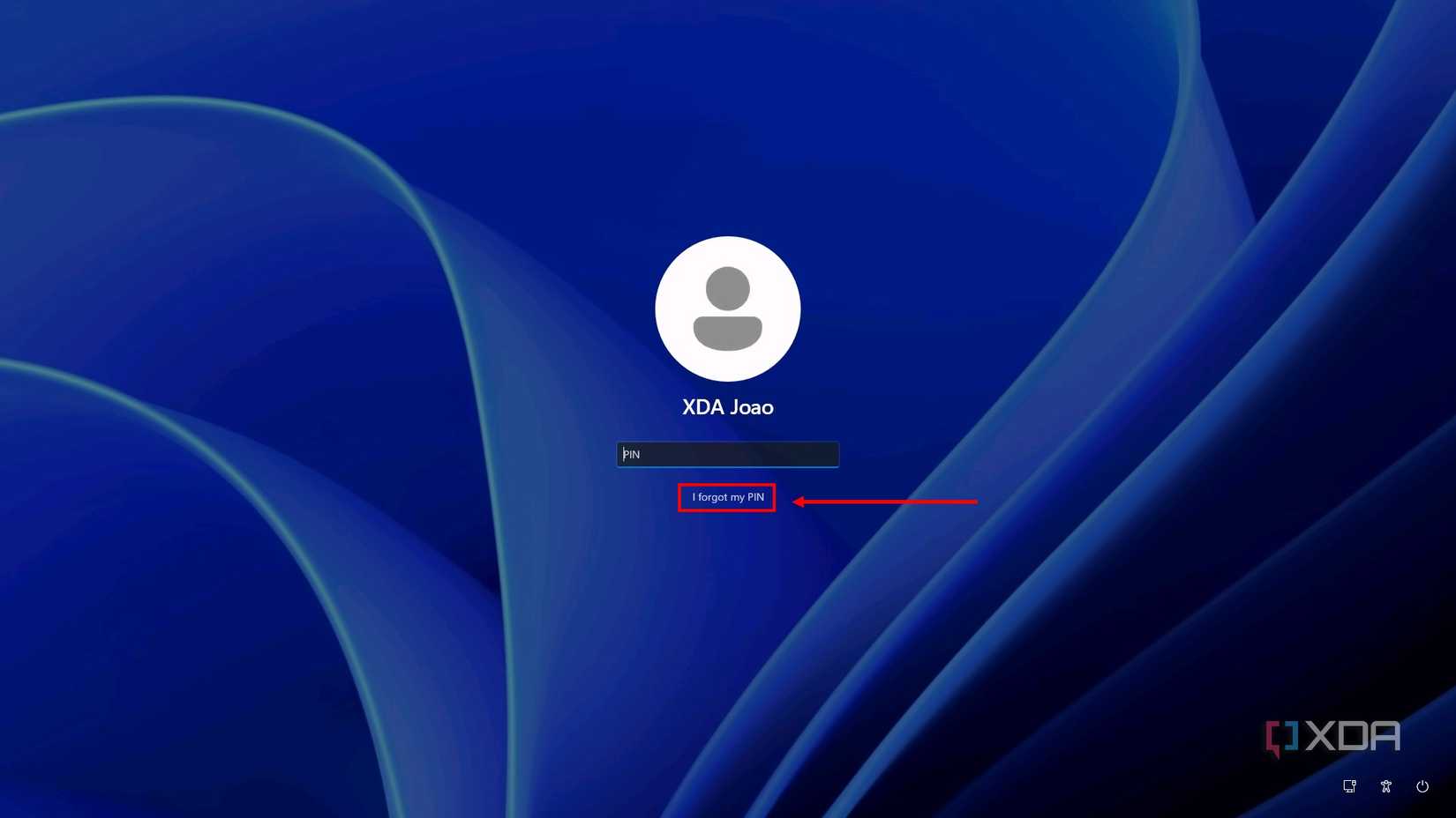 Screenshot of the Windows 11 sign-in screen with the I forgot my PIN button highlighted