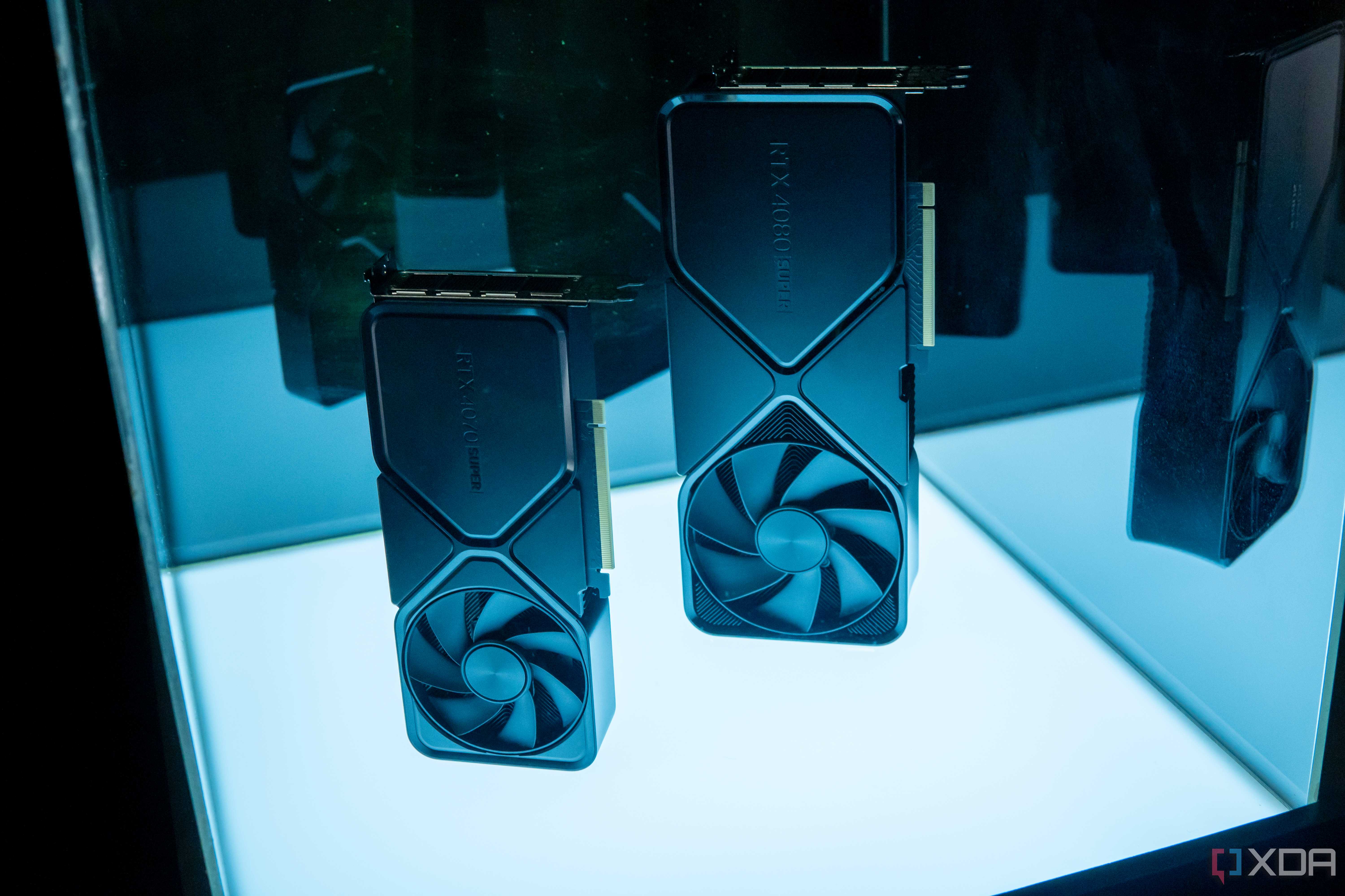 Nvidia GeForce RTX 4070 Super and GeForce RTX 4080 Super Founders Edition GPUs standing vertically