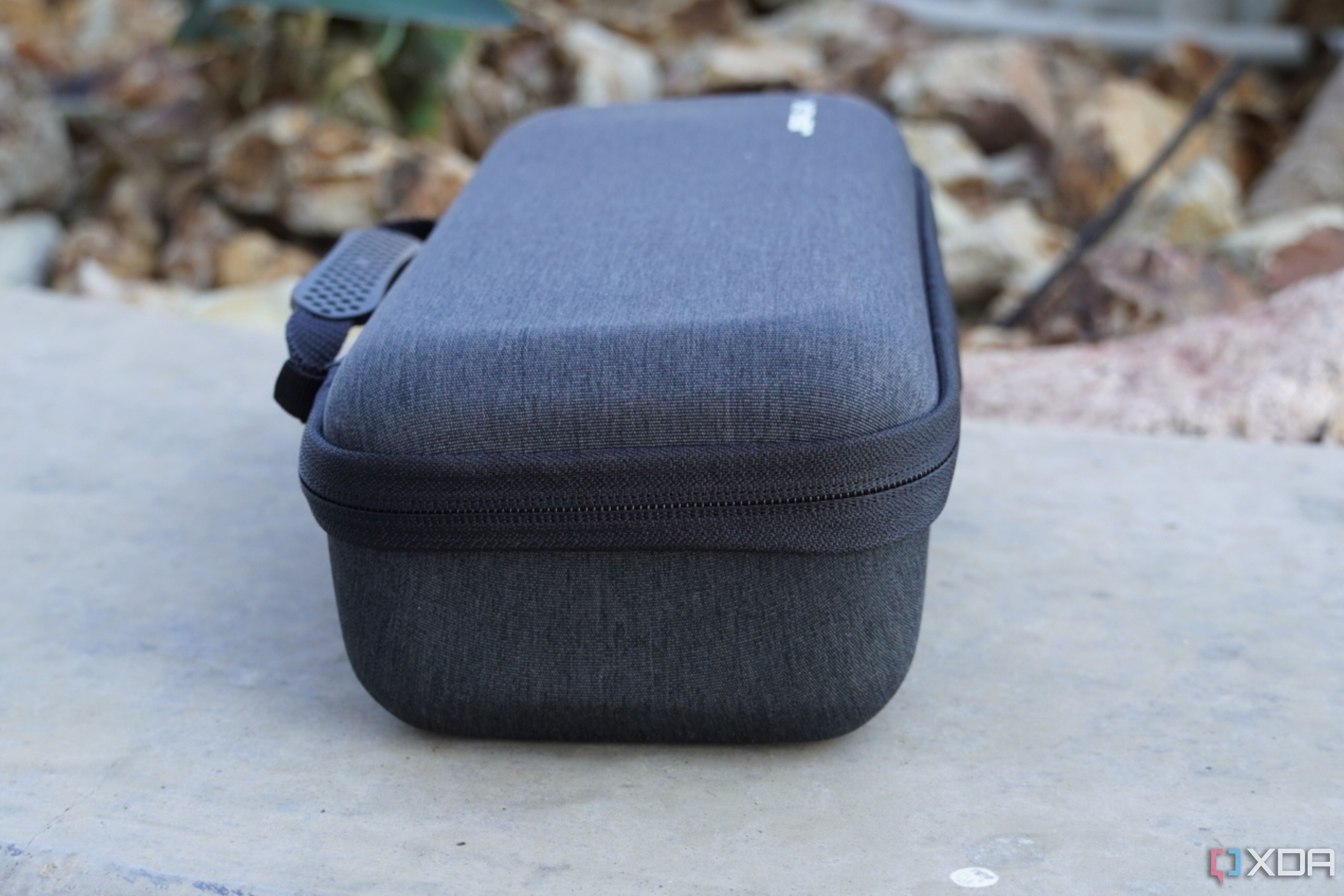 The thickness of the Jsaux Carrying Case.