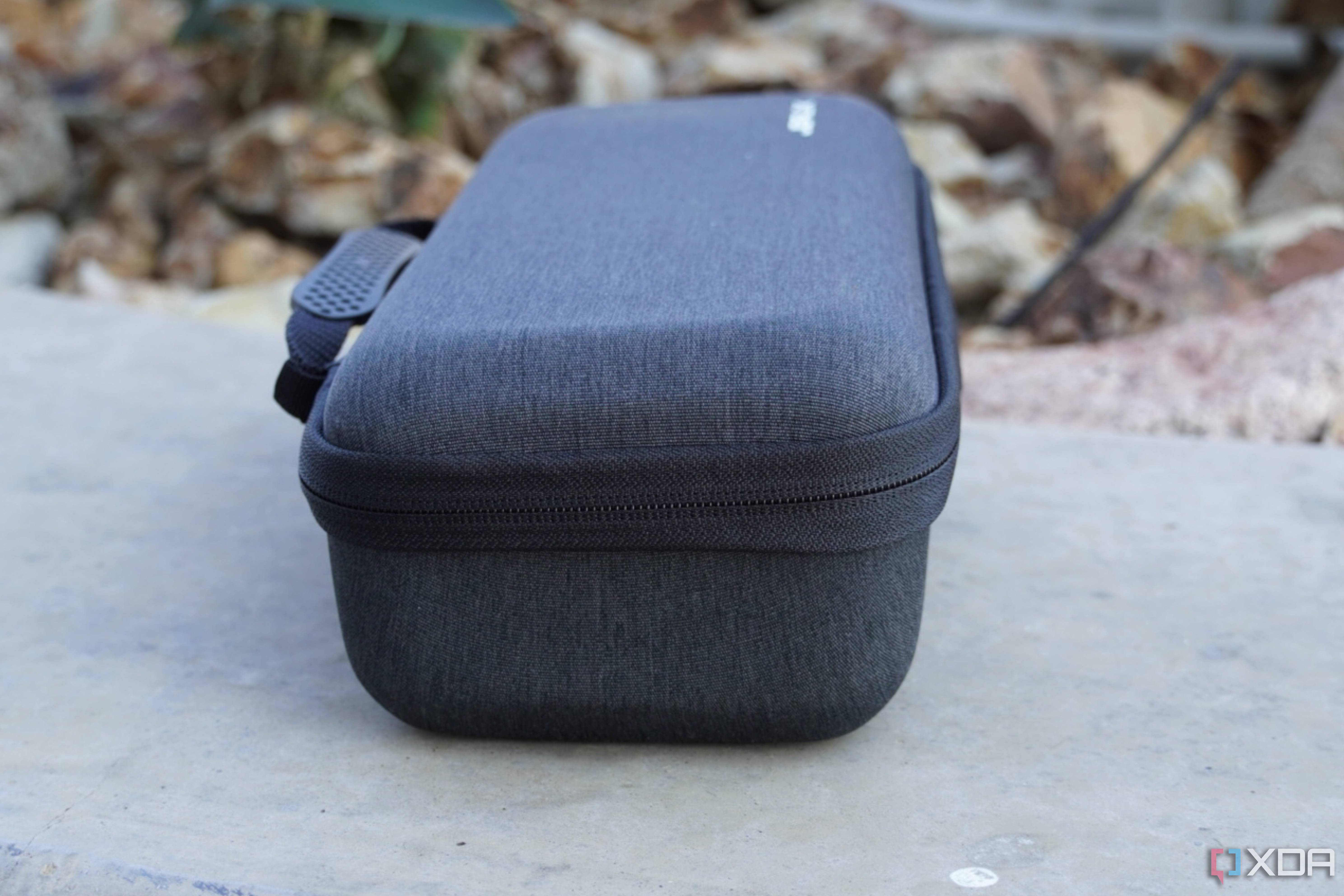 The thickness of the Jsaux Carrying Case.