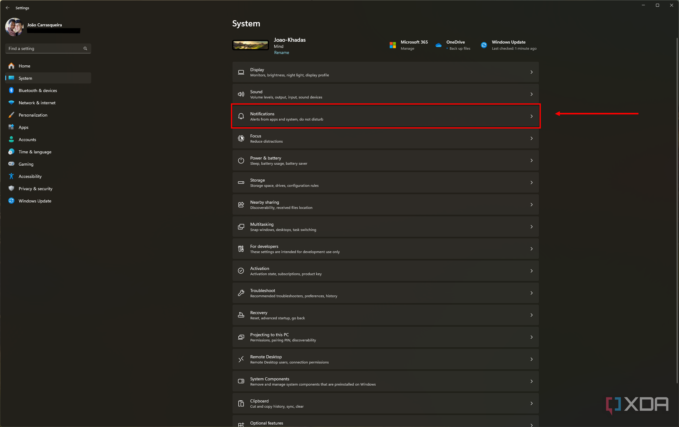 Screenshot of the System section of the Windows 11 Settings app with the notifications button highlighted