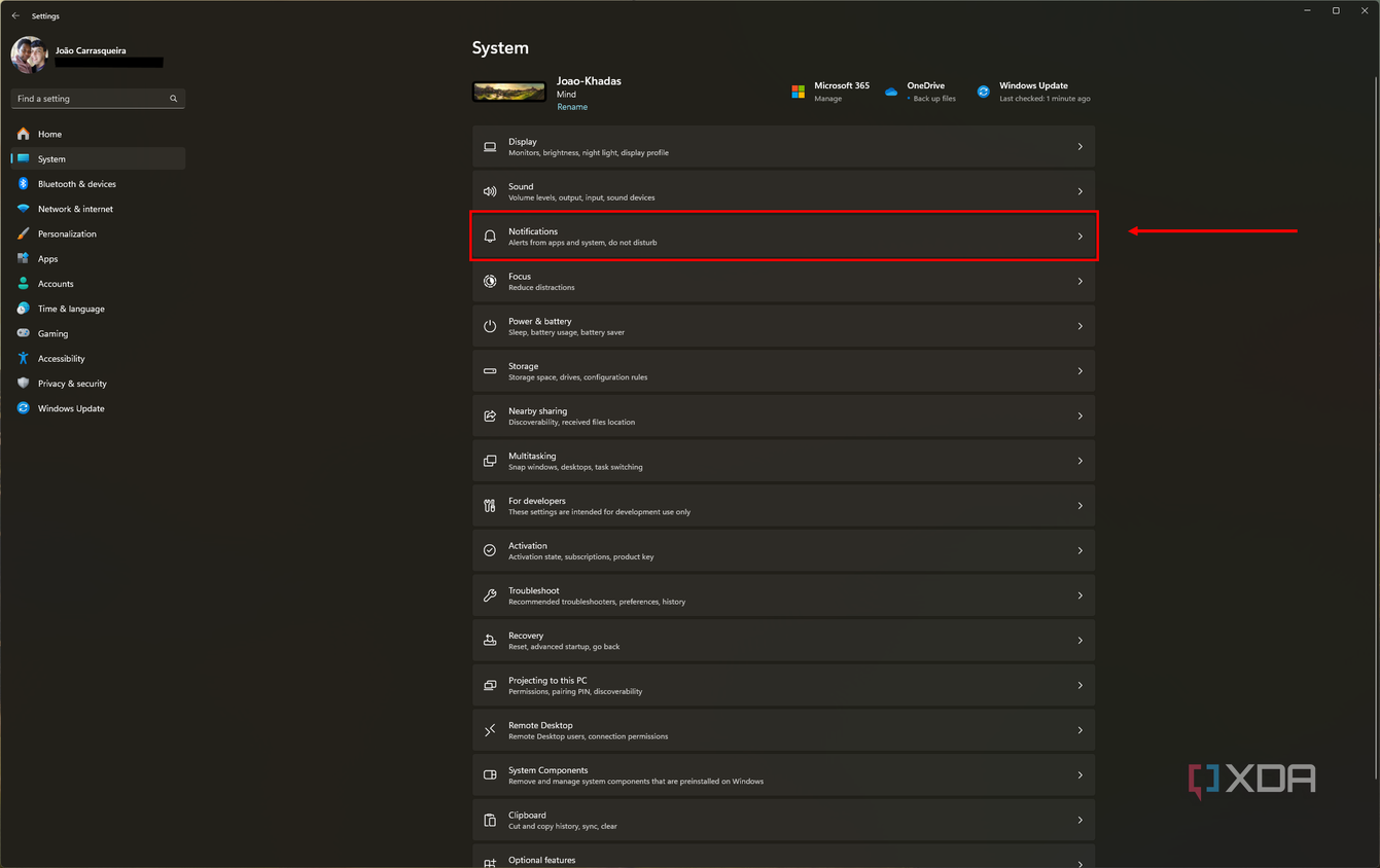 Screenshot of the System section of the Windows 11 Settings app with the notifications button highlighted