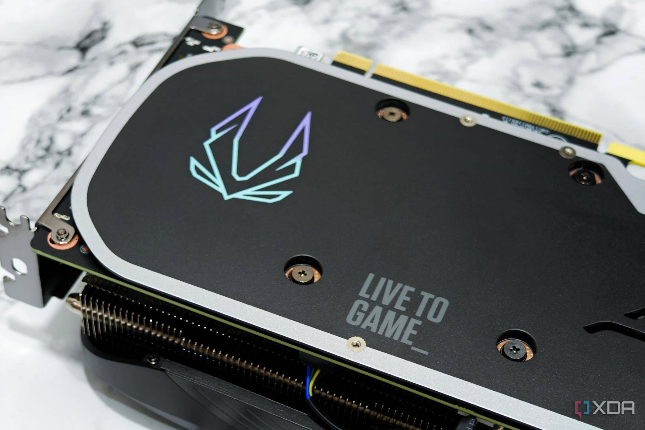An image showing the Zotac branding on its RTX 4070 Super Trinity Black Edition GPU backplate.