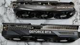 An image showing a Zotac Gaming RTX 4070 Super GPU kept next to Gigabyte RTX 4070 Ti Gaming OC GPU for size comparison.