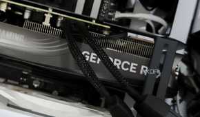 An image showing a Zotac Gaming GeForce RTX 4070 Super Trinity Black Edition GPU installed on a computer.power.
