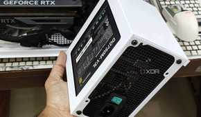 An image showing a person holding the PSU shroud with a PSU in hand.