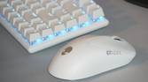 An Alienware Pro Gaming Mouse as part of a desk setup.