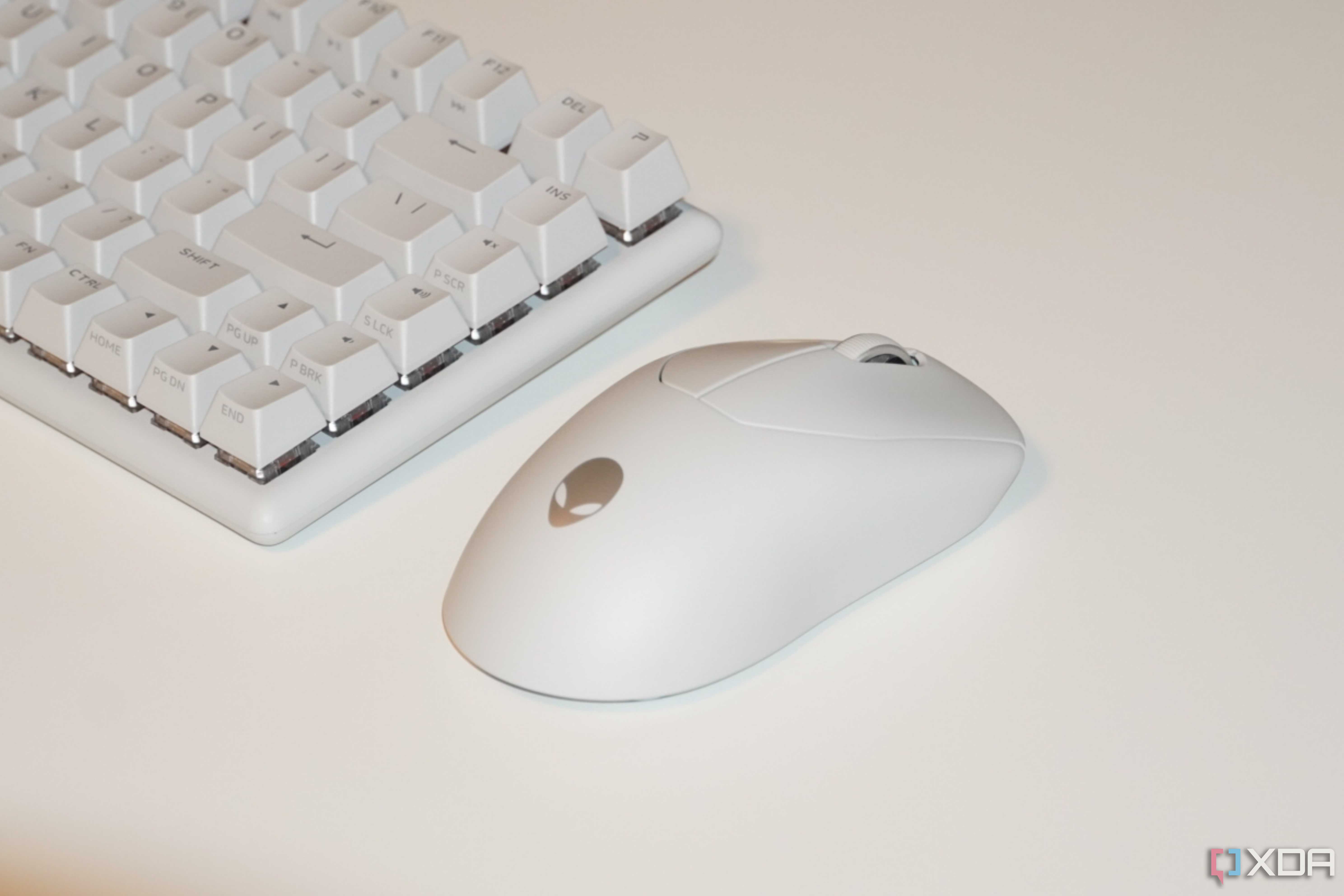 The Alienware Pro Gaming Mouse next to an Alienware keyboard.