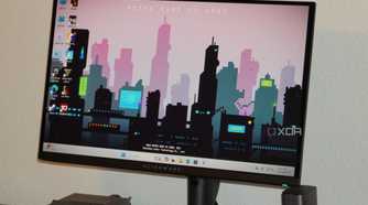 The Alienware QD OLED monitor on the Home Screen.