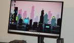 The Alienware QD OLED monitor on the Home Screen.