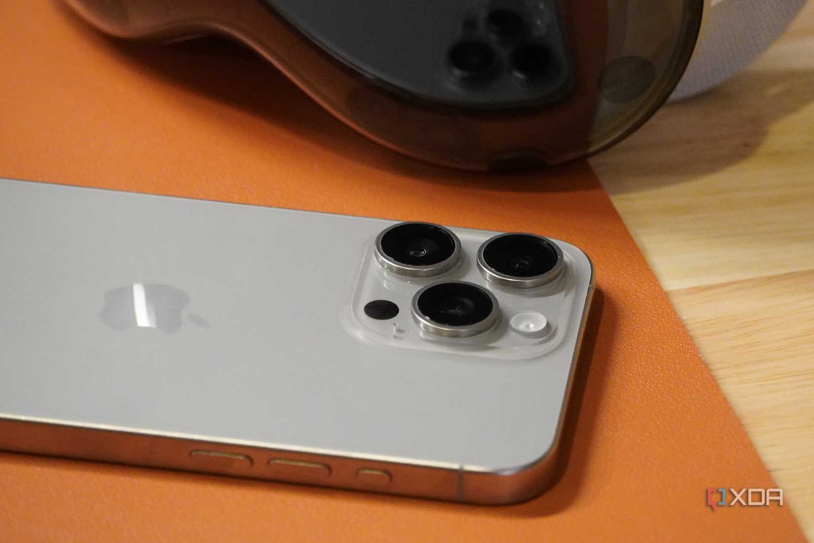 iPhone 15 Pro Max cameras next to Apple Vision Pro.