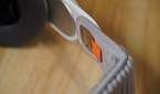 The strap attachment mechanism on Apple Vision Pro.