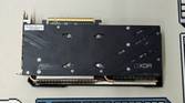 An image showing the backplate of the ASRock Challenger 7700XT GPU.