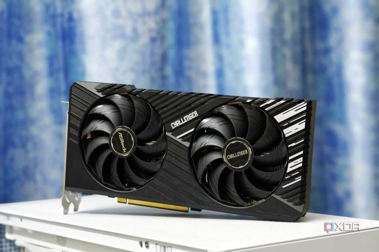 An image showing the ASRock Challenger RX 7700 XT 12G OC GPU kept on a white-colored PC case.