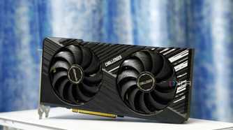 An image showing the ASRock Challenger RX 7700 XT 12G OC GPU kept on a white-colored PC case.
