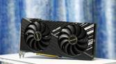 An image showing the ASRock Challenger RX 7700 XT 12G OC GPU kept on a white-colored PC case.