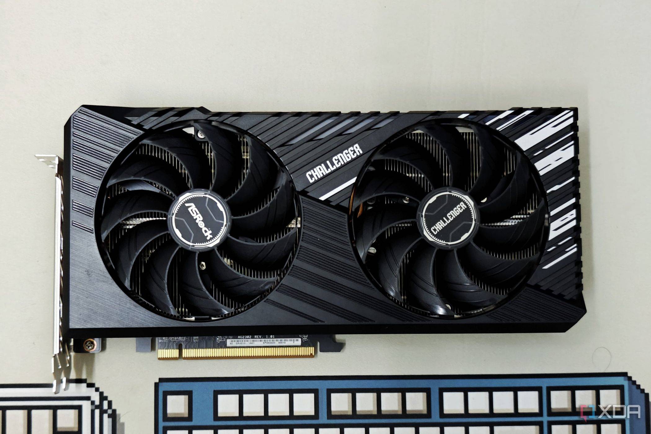 An image showing the front of the ASRock Challenger RX 7700 XT.
