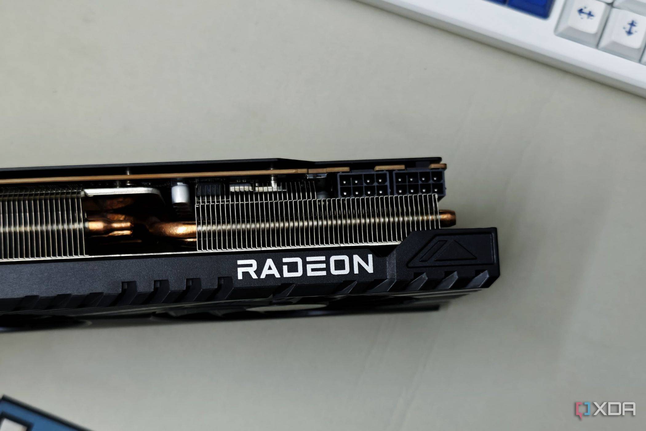 An image showing the Radeon branding on the ASRock Challenger RX 7700 XT GPU.