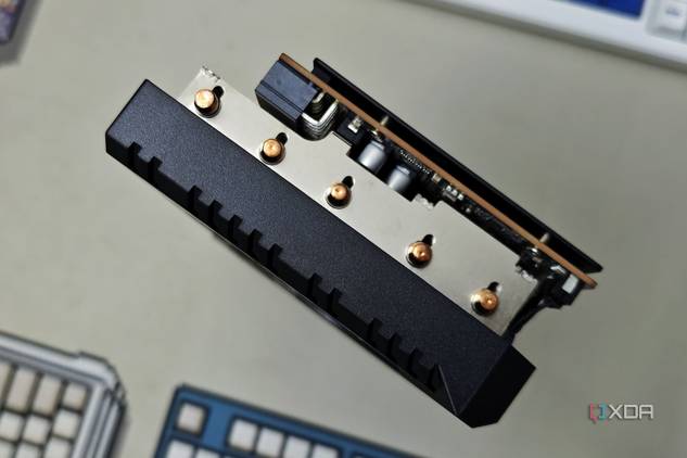 An image showing the top of the ASRock Challenger RX 7700 XT GPU.