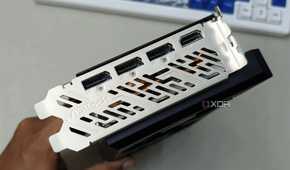An image showing the IO shroud and ports of the ASRock RX 7700 XT GPU.