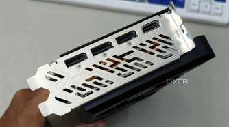 An image showing the IO shroud and ports of the ASRock RX 7700 XT GPU.