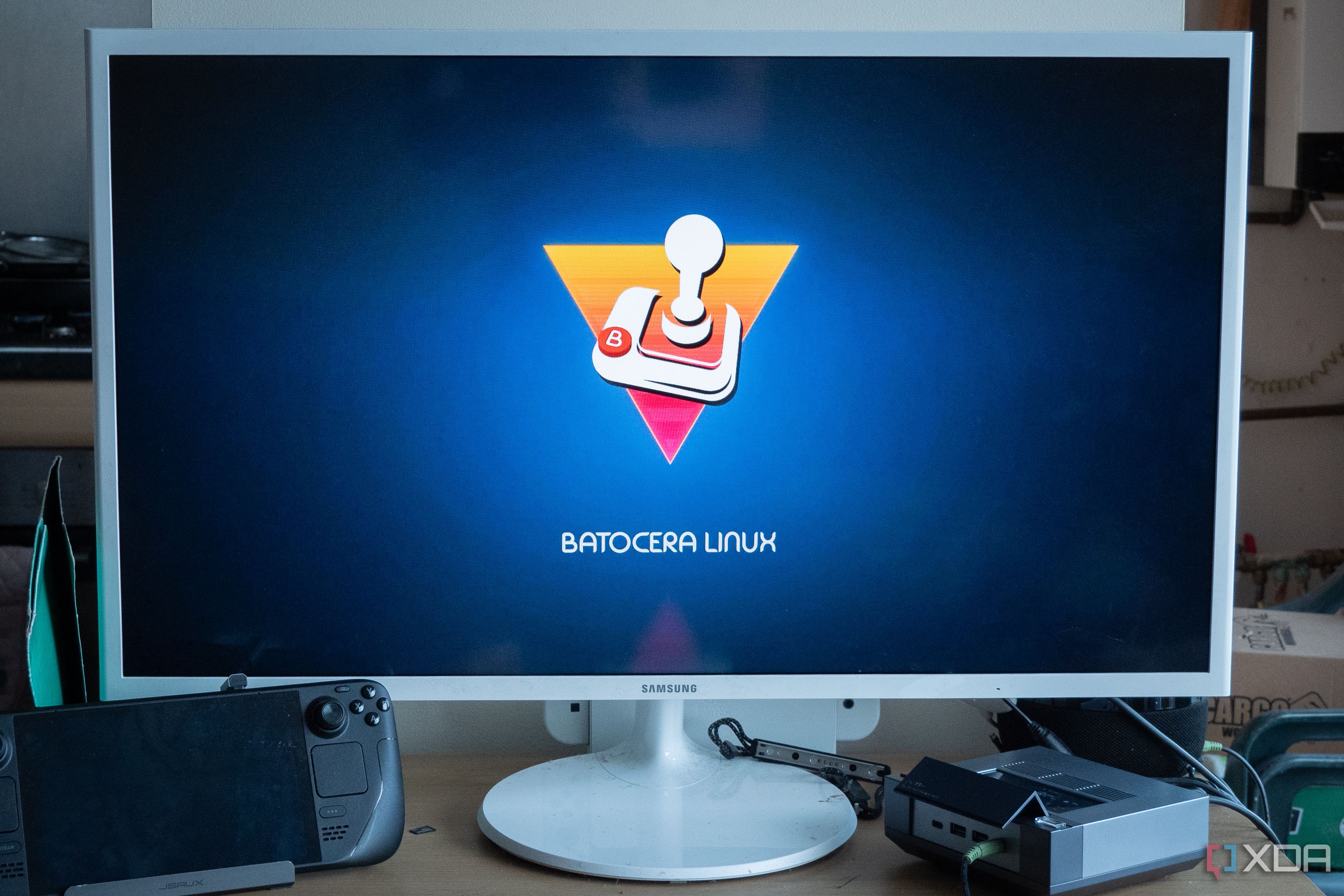 Batocera running on the Ayaneo AM02 showing the Batocera Linux splashscreen on a TV