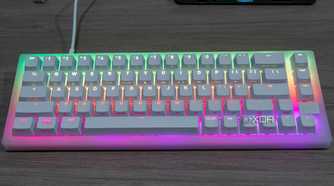 Dront view of the Cherry Xtrfy K5V2 keyboard with RGB lighting in rainbow colors