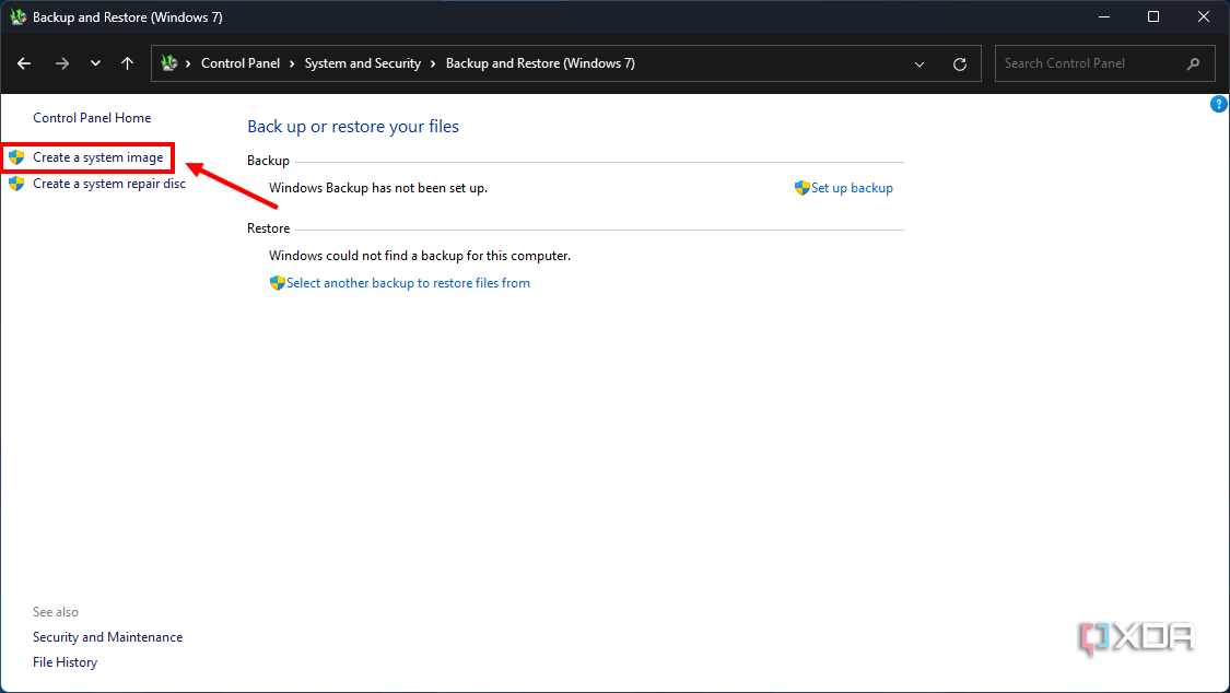 Screenshot of the Backup and restore section in Windows 11 Control Panel with the option to create a system image highlighted