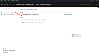 Screenshot of the Backup and restore section in Windows 11 Control Panel with the option to create a system image highlighted