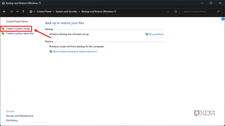 Screenshot of the Backup and restore section in Windows 11 Control Panel with the option to create a system image highlighted