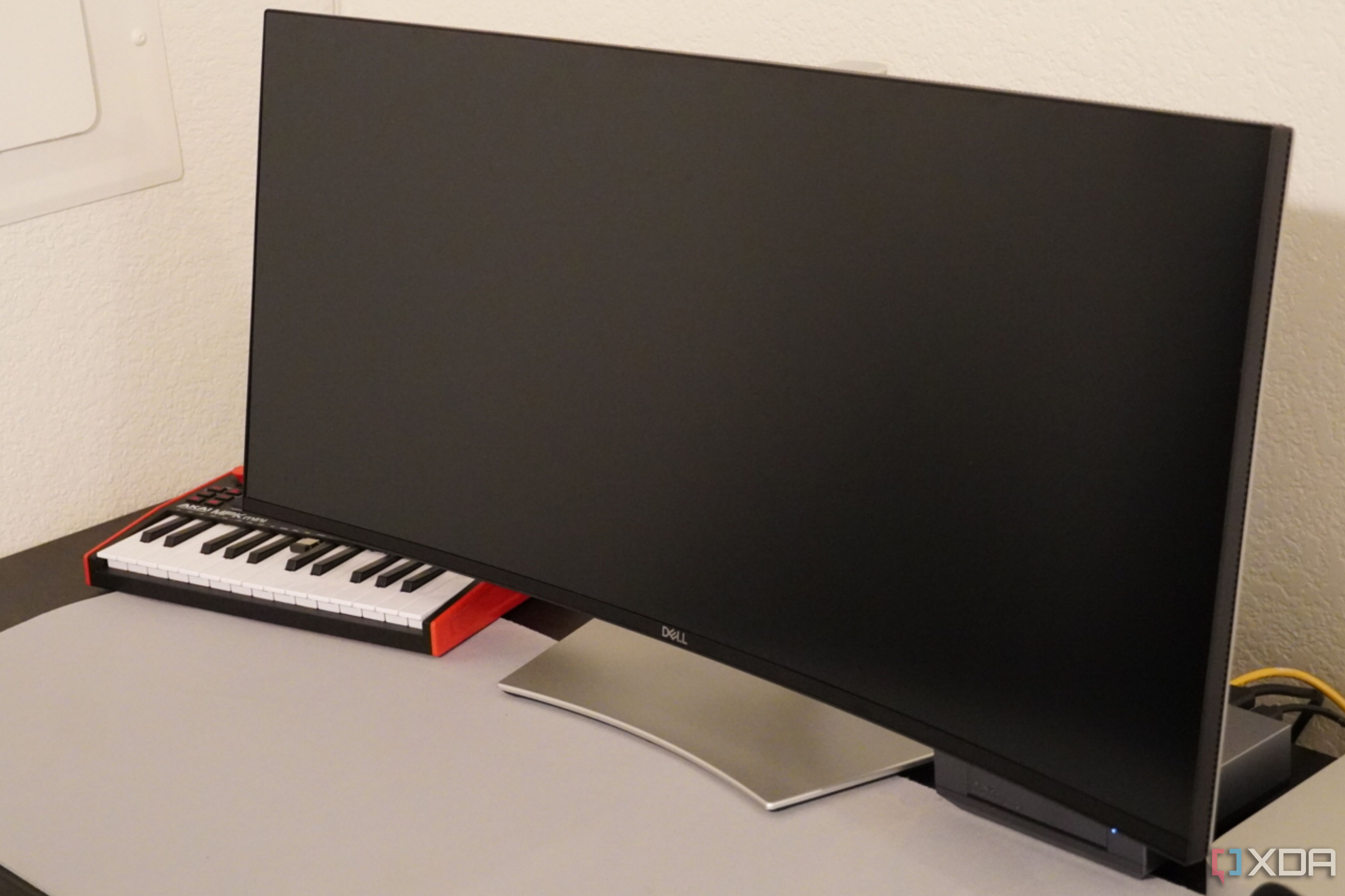 The Dell UltraSharp monitor at its lowest height.
