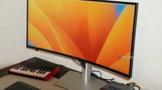 The macOS Home Screen on the Dell UltraSharp 34 Thunderbolt monitor.