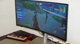 Fortnite gameplay on the Dell UltraSharp 34 monitor.