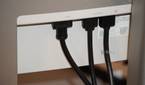 Video and power cables coming out of the UltraSharp 34 monitor.