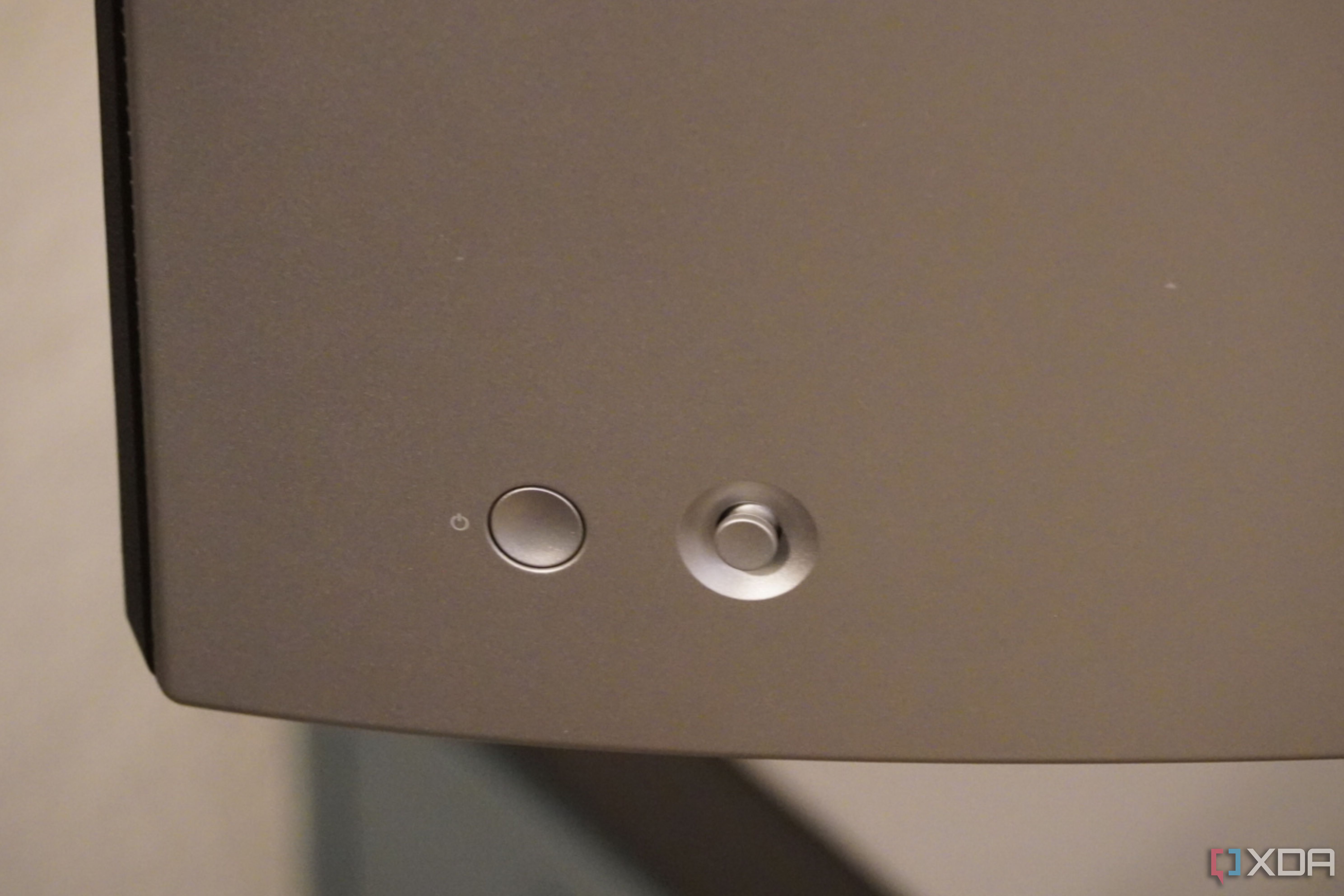 The power button and menu controls on the Dell UltraSharp 34.