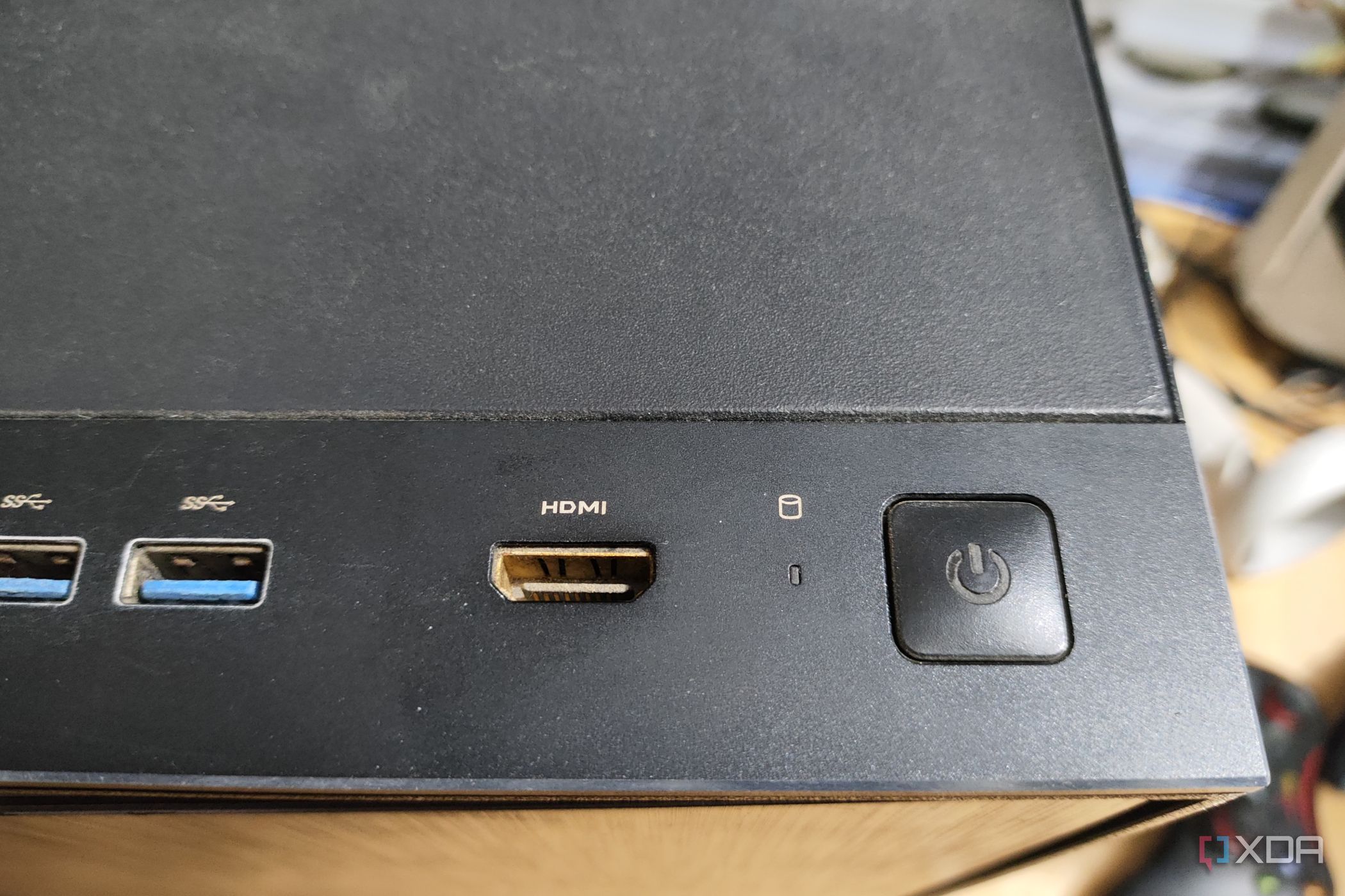 An image depicting the HDMI port on the front panel of a PC cabinet