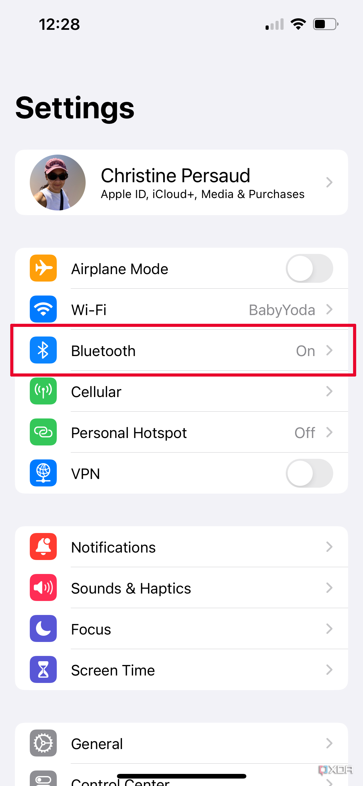 iPhone Settings Menu with Bluetooth selected.