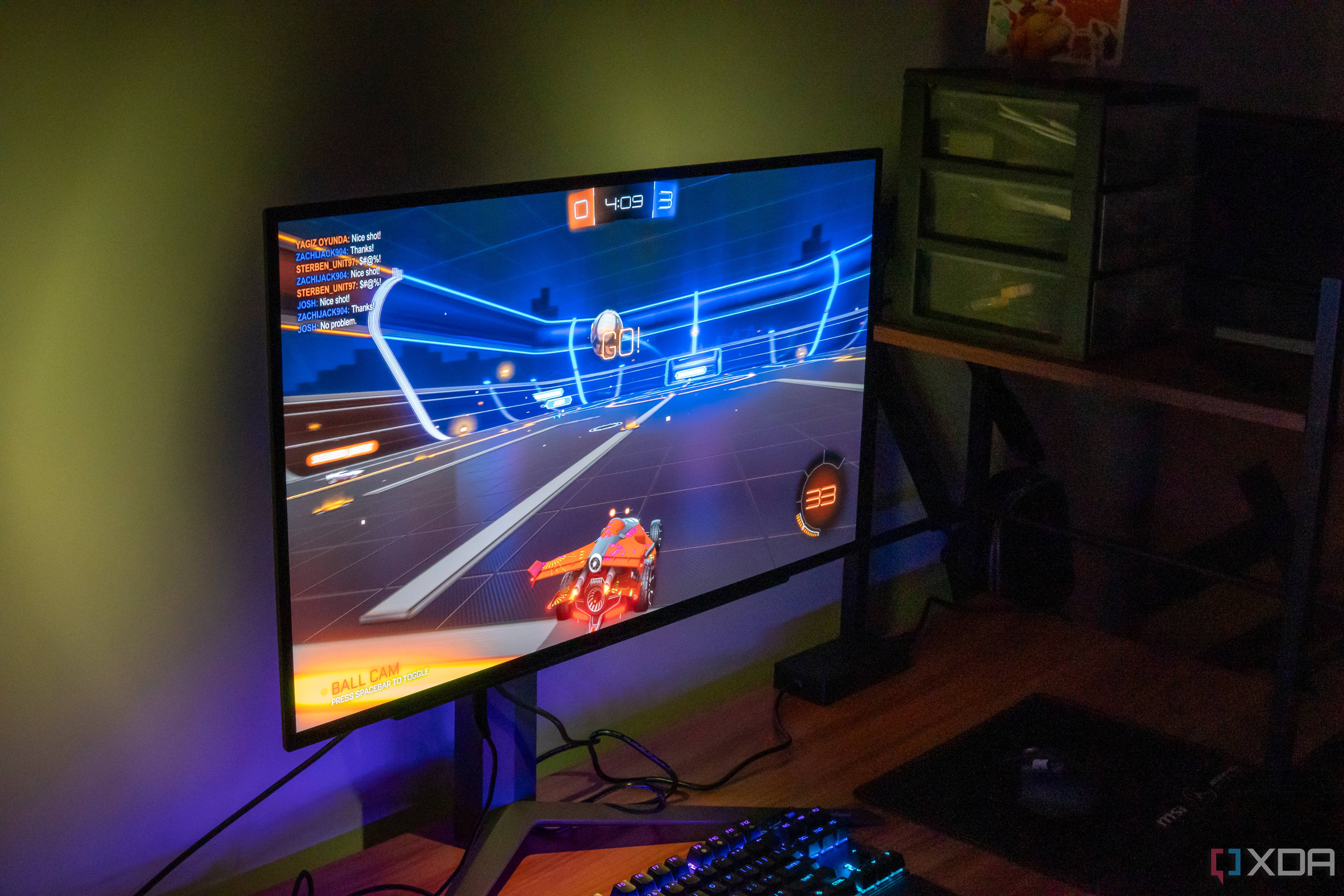 Left angled view of an LG UltraGear 27GR95QE monittor playing Rocket League